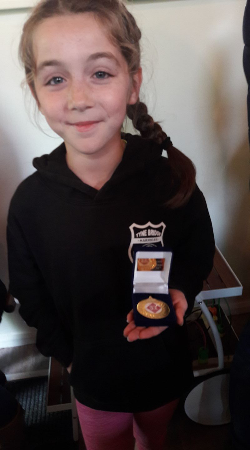 Anna with her Gold Medal