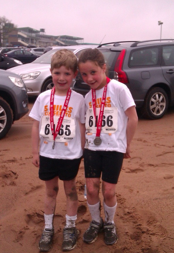 Jake and Hope show off their medals...