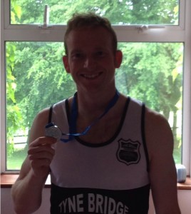 Tim with his finisher's medal