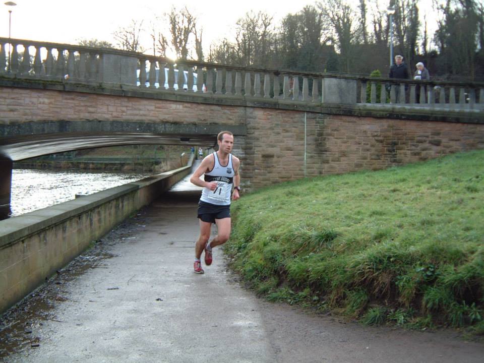 John approaching the finishing line.