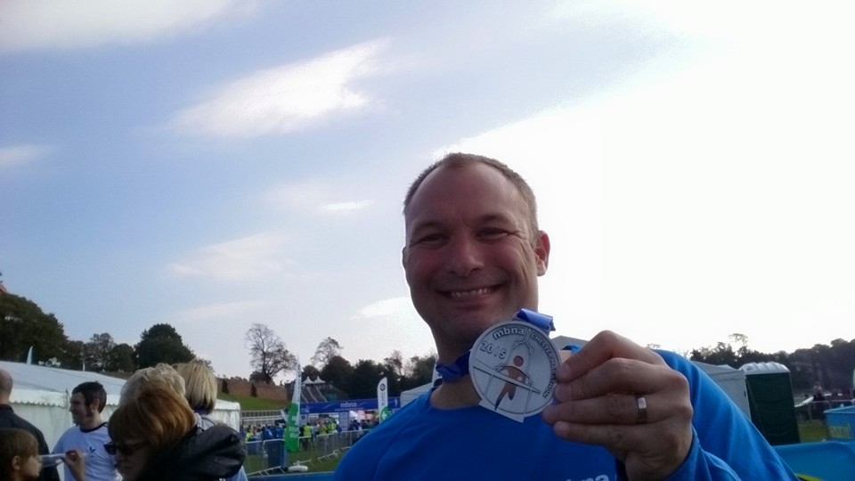 Simon with his finisher's medal