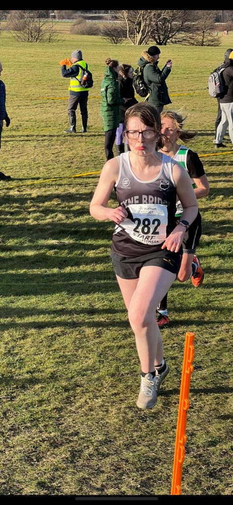 Photo of Claire looking very miserable while running